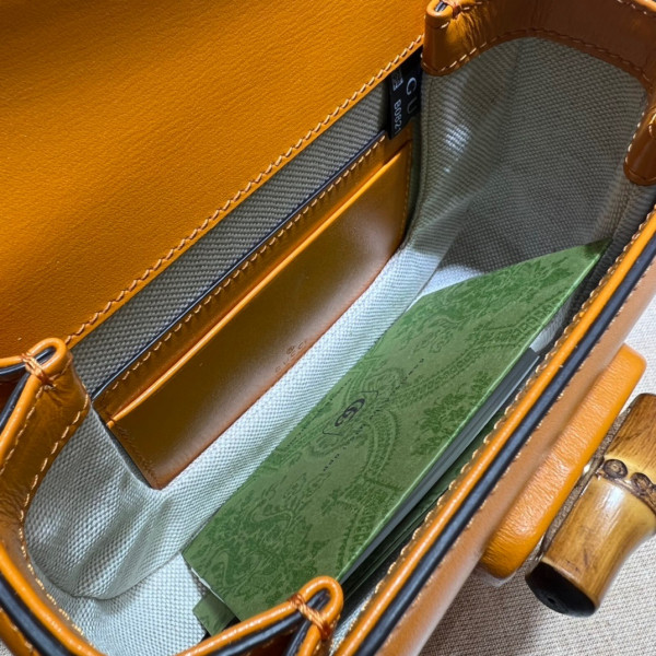 G*u*i mini top handle bag with bamboo
