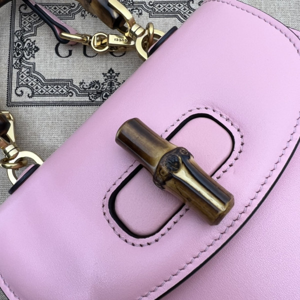 G*u*i mini top handle bag with bamboo