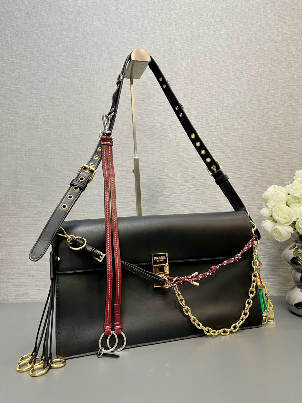 Pra*a soft sound large leather shoulder bag with charms