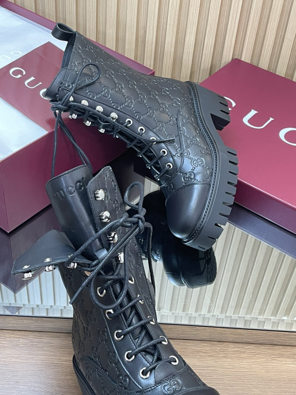 G*u*i boots